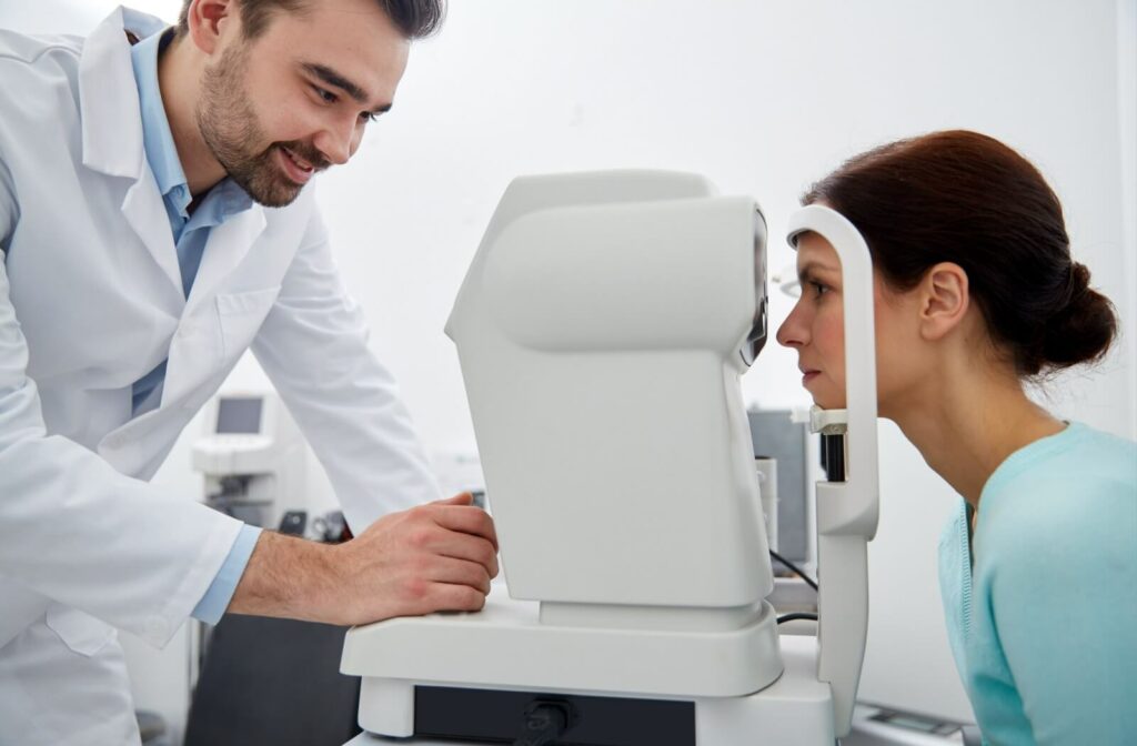 Patient receiving eye pressure test to detect early signs of glaucoma.