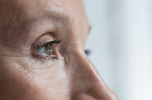 A close-up side profile of a person’s healthy, clear eye, illustrating the successful results of cataract management and the restoration of visual clarity.