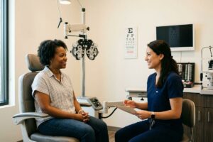 Eye doctor in Austin consulting with a person about preventative eye care.